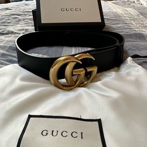 Authentic Gucci black belt with gold emblem